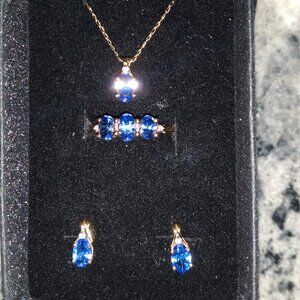 10k solid gold tanzanite & diamond set